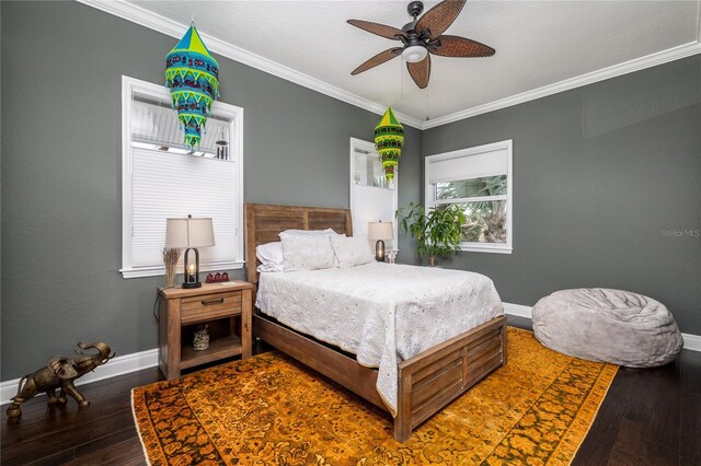 137 Big Pass Ln, Sarasota, FL 34242 - bedroom with baseboards, hardwood / wood-style flooring, ceiling fan, and ornamental molding