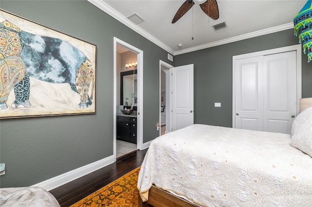 137 Big Pass Ln, Sarasota, FL 34242 - bedroom with baseboards, visible vents, wood finished floors, and ornamental molding