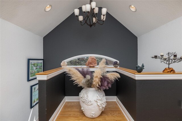 137 Big Pass Ln, Sarasota, FL 34242 - room details with baseboards, wood finished floors, recessed lighting, and an inviting chandelier