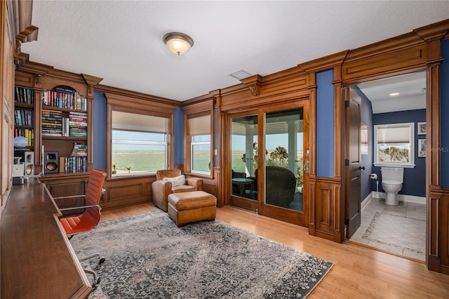 137 Big Pass Ln, Sarasota, FL 34242 - sitting room featuring baseboards, visible vents, and wood finished floors