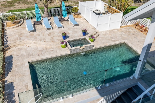 137 Big Pass Ln, Sarasota, FL 34242 - view of swimming pool featuring a fenced backyard, a fenced in pool, an in ground hot tub, and a patio