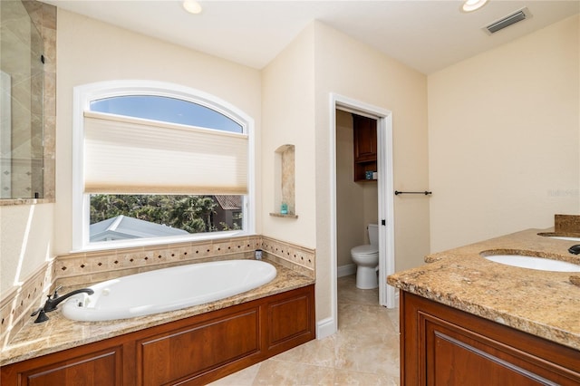 137 Big Pass Ln, Sarasota, FL 34242 - full bath featuring toilet, tiled shower, a bath, visible vents, and recessed lighting