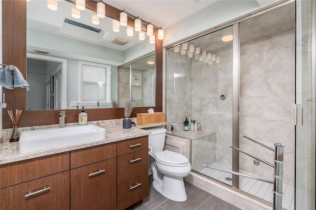 137 Big Pass Ln, Sarasota, FL 34242 - bathroom featuring vanity, toilet, tile patterned floors, and a shower stall