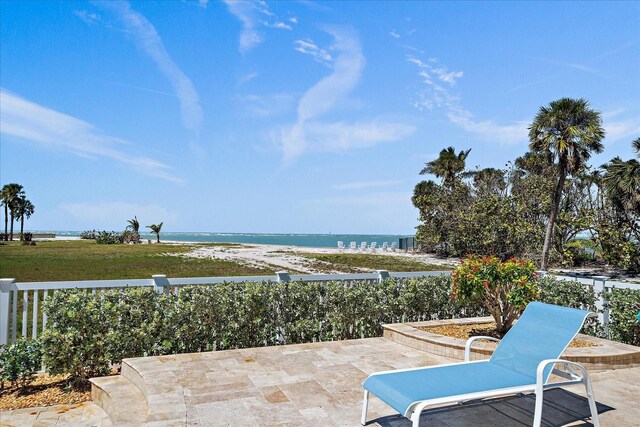 137 Big Pass Ln, Sarasota, FL 34242 - view of patio with a water view