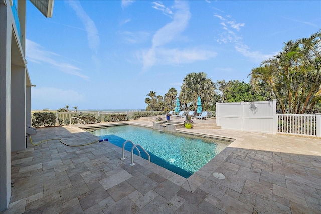 137 Big Pass Ln, Sarasota, FL 34242 - view of pool with a pool with connected hot tub, fence, and a patio