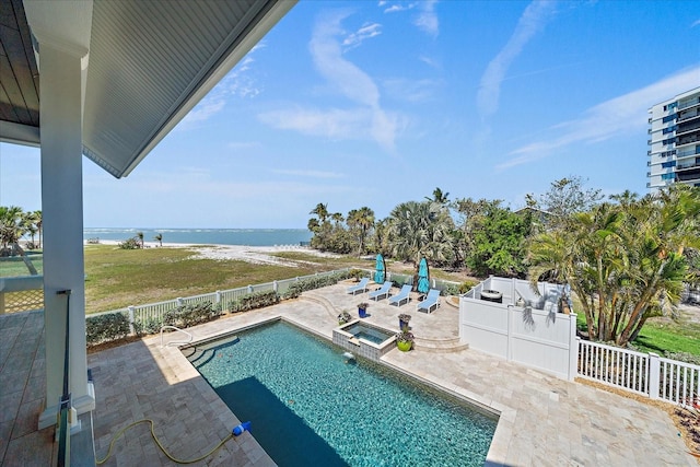 137 Big Pass Ln, Sarasota, FL 34242 - view of pool with a pool with connected hot tub, a water view, fence, and a patio area