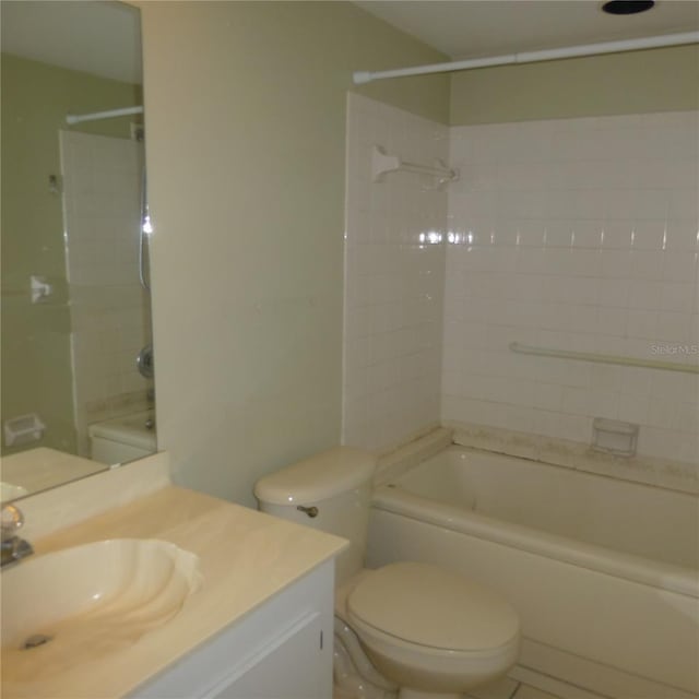 full bath featuring vanity, toilet, and shower / bathtub combination