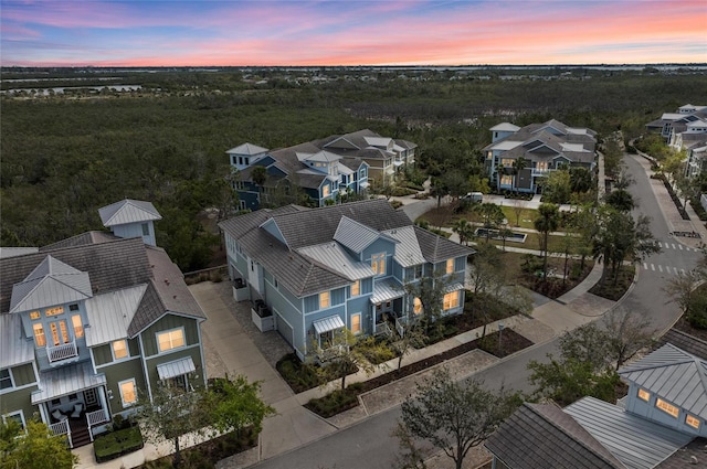 aerial view at dusk with a residential view