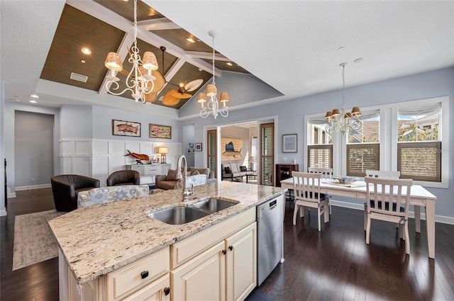 kitchen featuring visible vents, dark wood finished floors, stainless steel dishwasher, a notable chandelier, and a sink