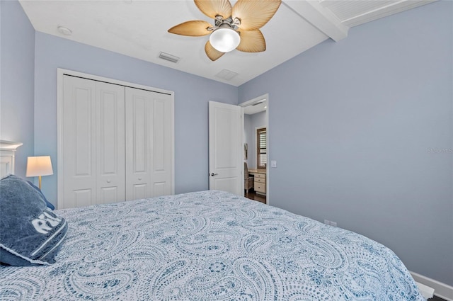 bedroom featuring visible vents, beamed ceiling, a closet, baseboards, and ceiling fan