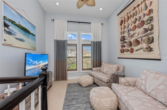 tiled living room with recessed lighting, baseboards, and ceiling fan