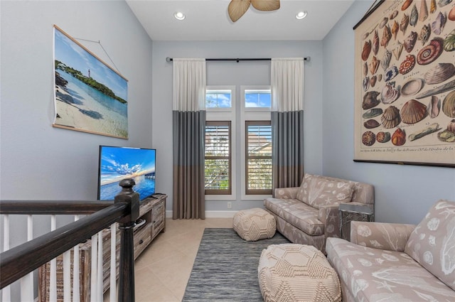 living area featuring recessed lighting, baseboards, light tile patterned flooring, and ceiling fan