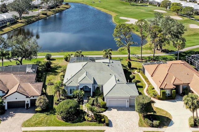 birds eye view of property with a water view