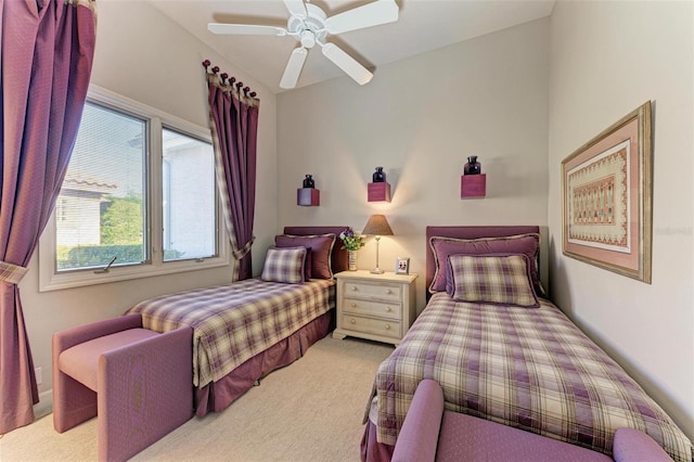 carpeted bedroom with a ceiling fan