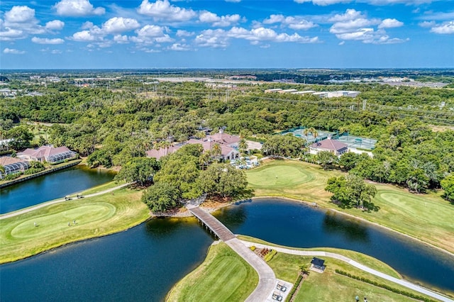 birds eye view of property featuring a water view and view of golf course