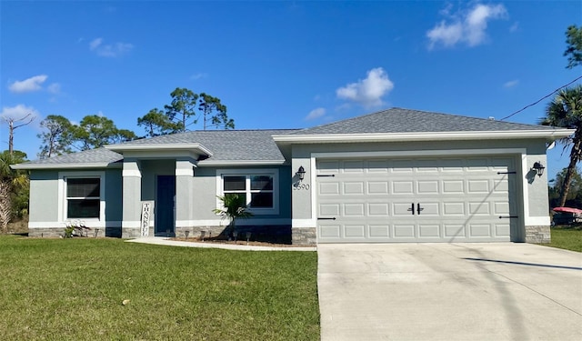 view of front of house featuring a front yard, roof with shingles, stucco siding, driveway, and an attached garage