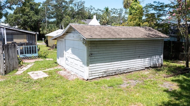 view of shed with fence