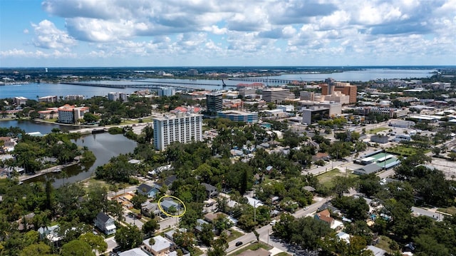 bird's eye view featuring a view of city and a water view