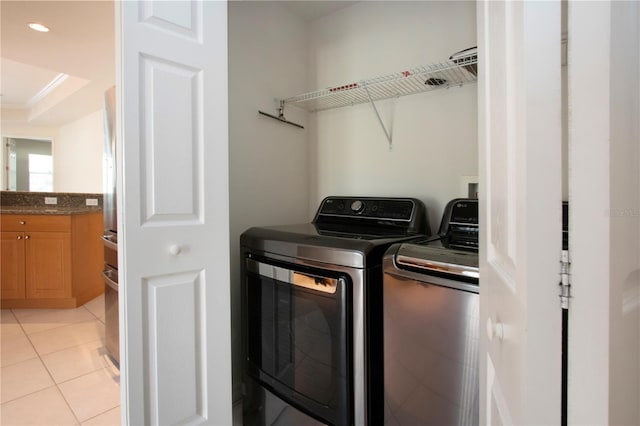 clothes washing area featuring ornamental molding, light tile patterned floors, laundry area, recessed lighting, and washer and dryer