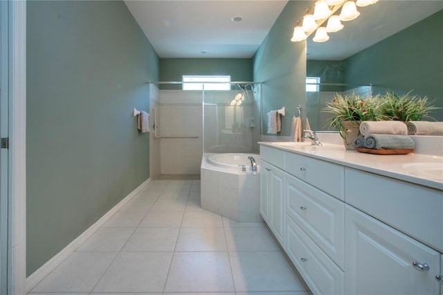 bathroom featuring a tile shower, tile patterned flooring, a bath, and a sink