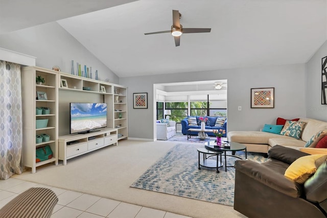 tiled living room with carpet flooring, lofted ceiling, and a ceiling fan