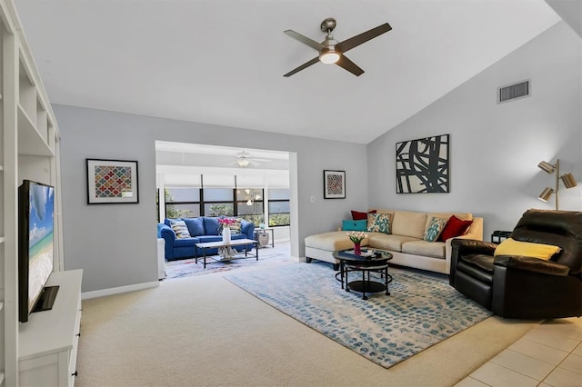 carpeted living area featuring visible vents, baseboards, a ceiling fan, and vaulted ceiling