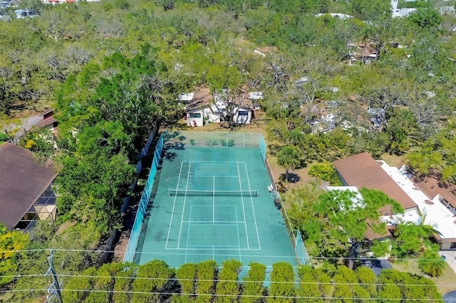 view of sport court with fence