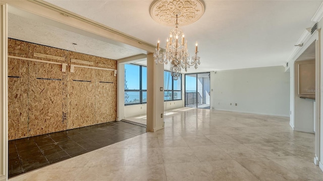 tiled spare room featuring baseboards and an inviting chandelier