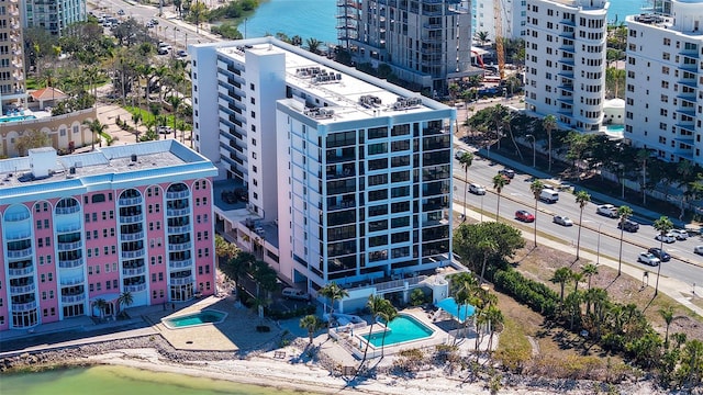 aerial view featuring a water view and a view of city