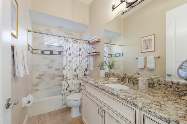 bathroom with tile patterned flooring, toilet, vanity, and shower / bath combo