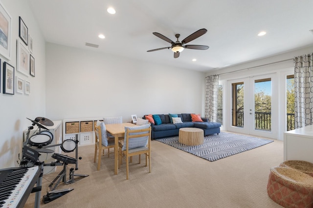 carpeted living room featuring recessed lighting, french doors, visible vents, and ceiling fan