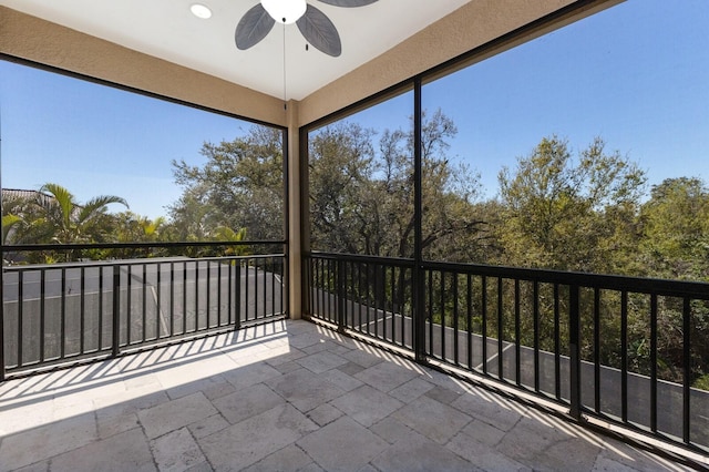 balcony featuring a ceiling fan