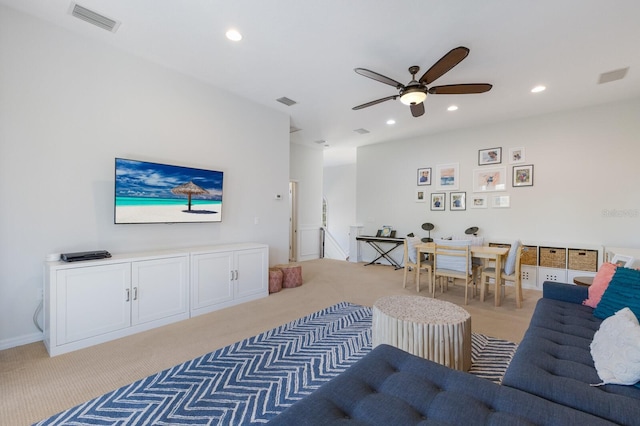 living room with recessed lighting, visible vents, light carpet, and ceiling fan