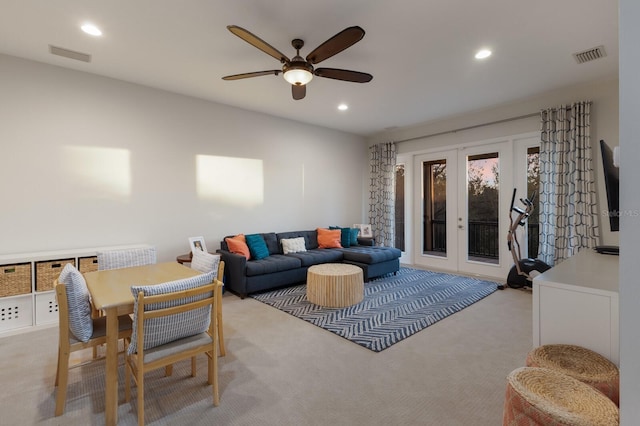 carpeted living room featuring visible vents, recessed lighting, french doors, and a ceiling fan