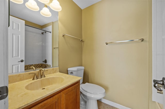 full bathroom with tile patterned floors, toilet, vanity, and walk in shower