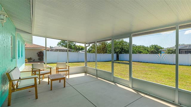 unfurnished sunroom with a wealth of natural light