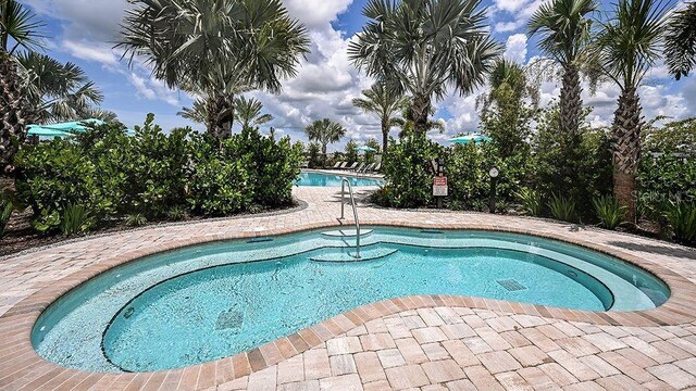 pool with a hot tub