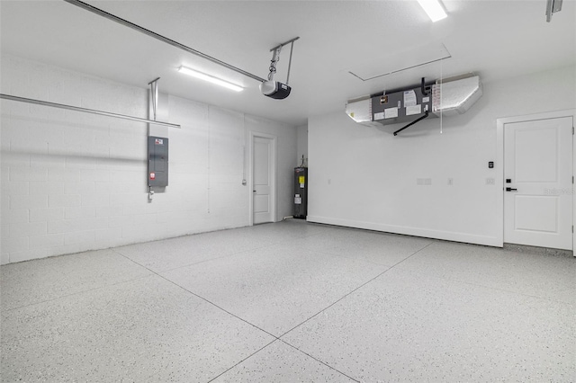 garage with electric panel, concrete block wall, a garage door opener, and water heater