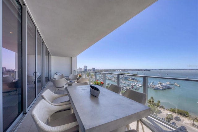 balcony with a city view and a water view