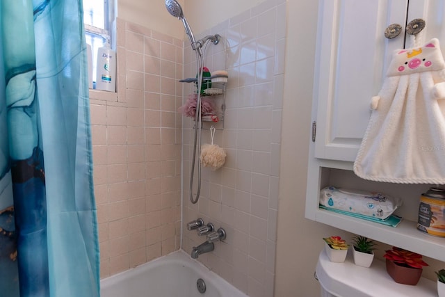 full bathroom with shower / tub combo