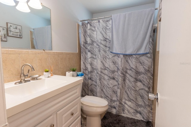 full bath with a shower with curtain, toilet, tile walls, and vanity