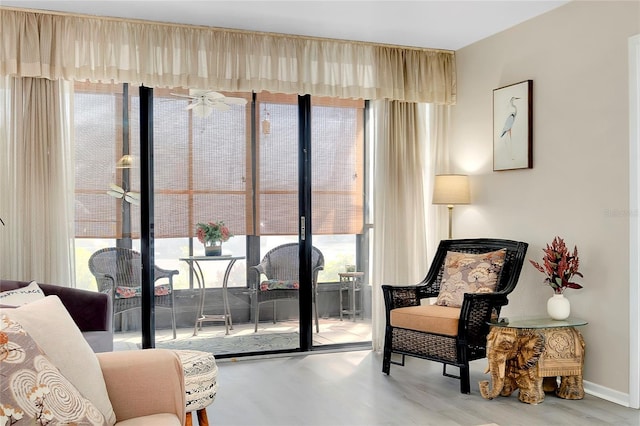 sitting room featuring baseboards