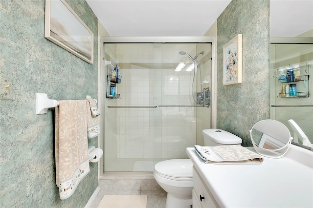 full bathroom featuring toilet, a stall shower, and tile patterned flooring