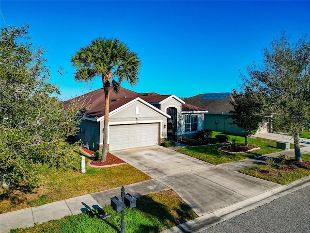 ranch-style house featuring stucco siding, an attached garage, concrete driveway, and a front lawn