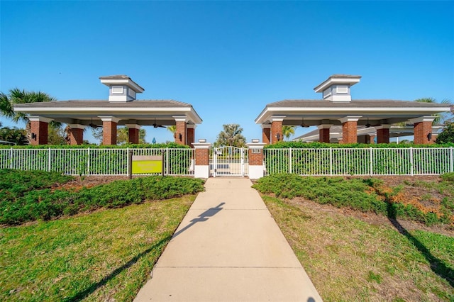 view of community featuring a gate and fence