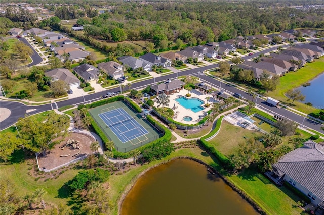 aerial view featuring a water view and a residential view