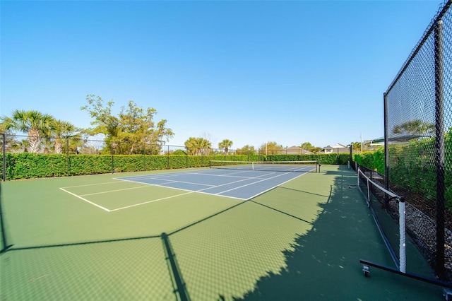 view of sport court featuring community basketball court and fence