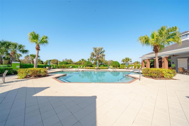 community pool featuring a patio