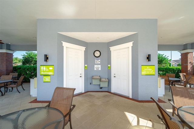 interior space featuring light tile patterned floors