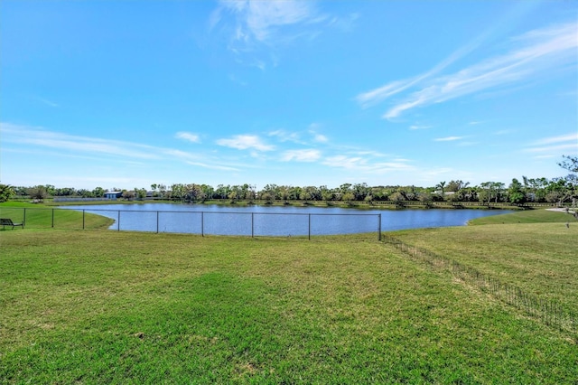 water view featuring fence